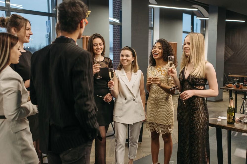 Guests with champagne at an evening party
